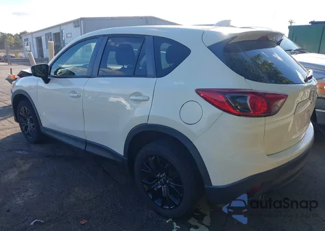 2014 Mazda Cx-5 Touring z USA, uszkodzony, nr VIN JM3KE2CY4E0306365